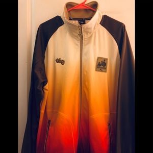 Vintage track jacket with standout gold zippers.